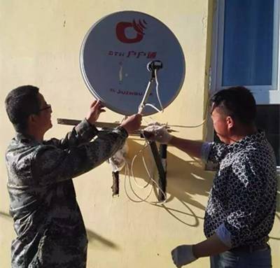 军民同心修设备，户户通里见真情——驻村干部助力乡村通讯畅通